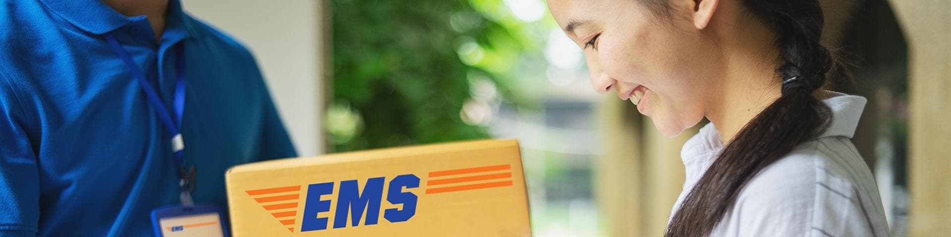 EMS courier handing over a parcel